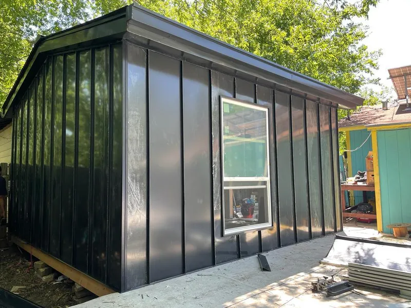 Black standing seam metal wall panels for Roof Inspection in Wayland